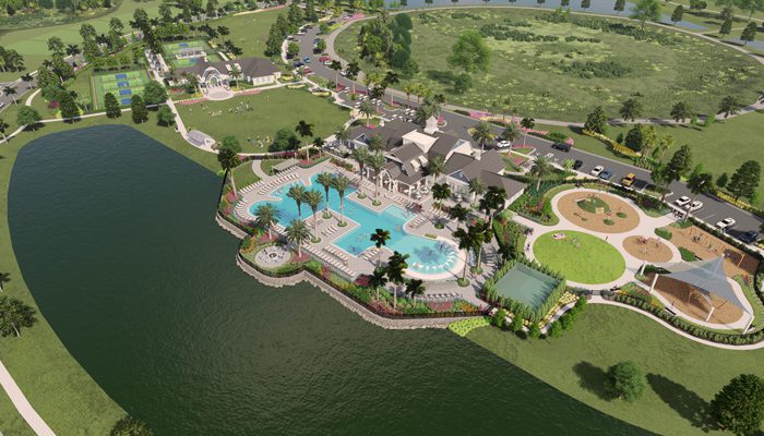 A luxury waterfront mansion with a large pool and lush greenery.